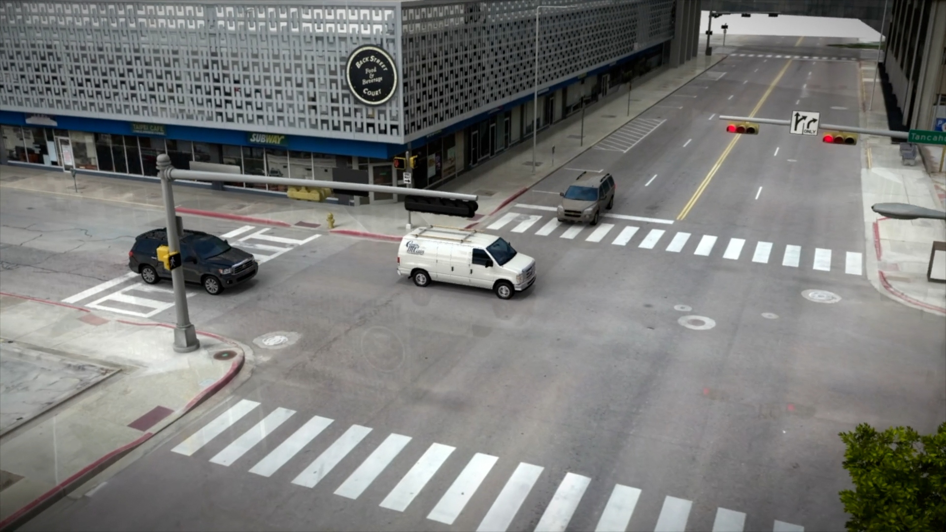 Downtown roadway reconstruction with multiple vehicles at a signalized intersection.